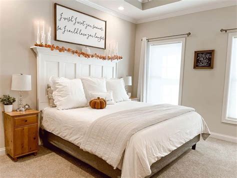 Beige Walls Complement a High Headboard - Soul & Lane