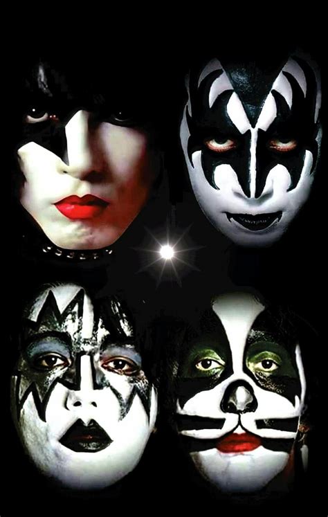 the kiss band's faces are painted in white and black with red lipstick on them