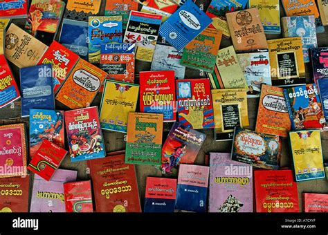 Selection of Burmese literature being sold at market Burma Myanmar Stock Photo - Alamy