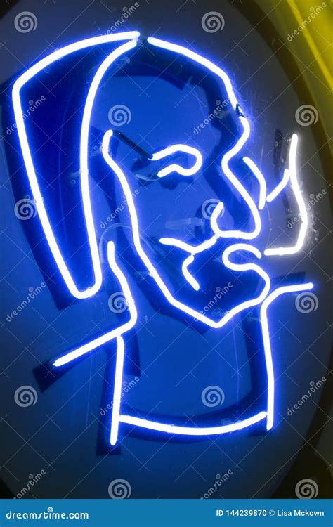 Zig Zag Man Logo On A Neon Sign Editorial Photo | CartoonDealer.com #144239879