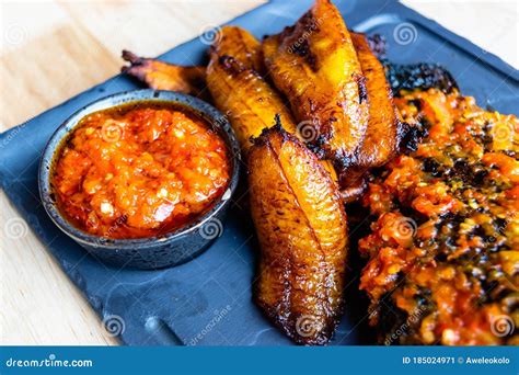 Nigerian Food: Delicious Fried Plantain with Red Chilli Souce Stock ...