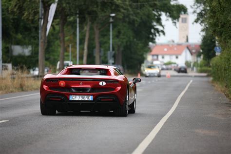 A Red Sports Car on the Road · Free Stock Photo