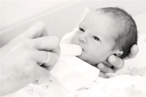 Newborn feeding syringe Stock Photos, Royalty Free Newborn feeding syringe Images | Depositphotos