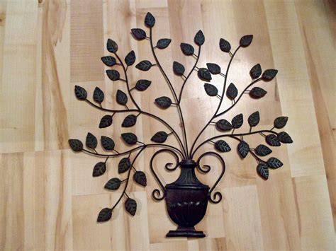 Metal Art Vase with leafy Vine Wall Hanging