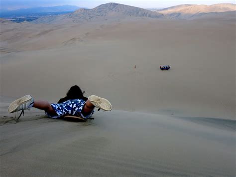 Sandboarding in Huacachina - Go Backpacking