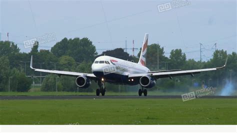 Airbus A320 Of British Airways Landing At Schiphol Airport Stock video footage | 11460667