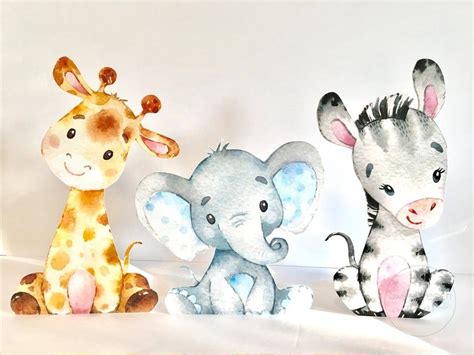 three watercolor paintings of giraffes, zebra and elephant sitting next to each other