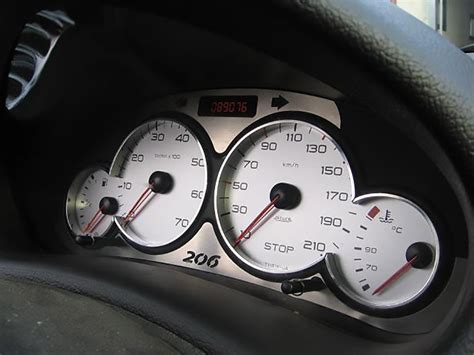 PEUGEOT 206 BELOW TACHOMETER COVER - autoCOVR | quality crafted automotive steel covers