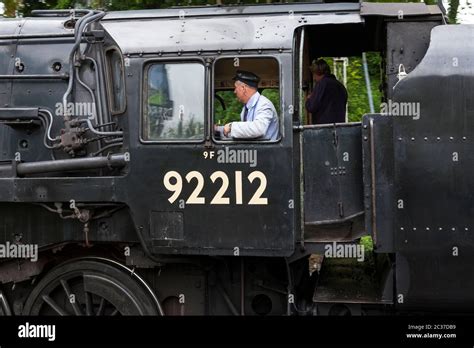 On the footplate of Standard Class 9F locomotive at Alresford Station on the Mid-Hants Steam ...