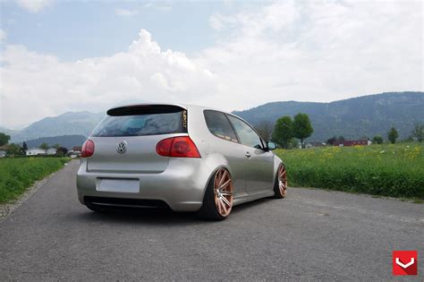 Stanced Out VW Golf GTI Sporting Multi Spoke Aftermarket Wheels Wrapped in Tires — CARiD.com Gallery