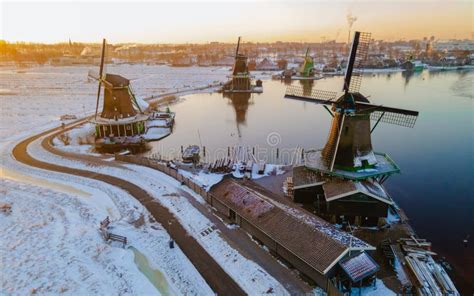 Zaanse Schans Windmill Village during Winter with Snow Landscape in the ...