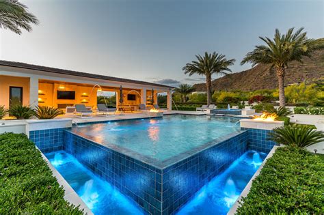 Infinity Edge Swimming Pool Designs — Presidential Pools, Spas & Patio ...