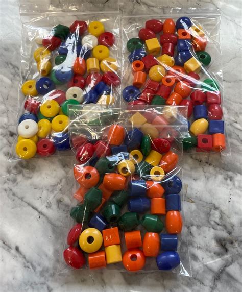 Abacus Beads (plastic) PK50 Assorted - The Shop