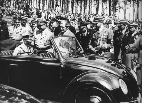 Adolf Hitler in a prototype Volkswagen Beetle, 1938