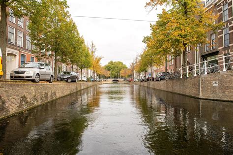 The Netherlands, Delft, October 2022. Canal Oude Delft in Delft canal boat cruise in autumn ...