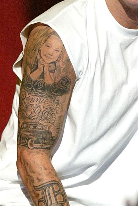 Eminem’s Upper Sleeve Tattoo: The Daughter and Bonnie and Clyde ...