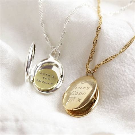 Personalised locket necklace.Engraved oval locket pendant.Hand-stamped inside plate.Completed by ...