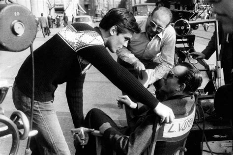 Alain Delon and Luchino Visconti on the set of Rocco and his brothers Alain Delon, Gorgeous Men ...