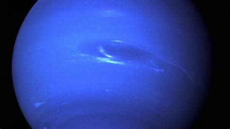 Hubble discovers a mysterious dark spot on Neptune, and it's getting bigger