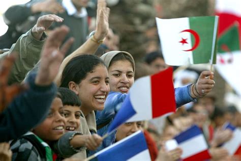 French and Algerian flags for French President Jacques Chirac in Oran (Algeria) - Photo by ...