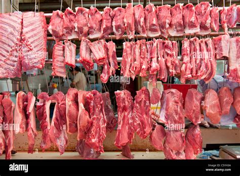 Cuts of Meat on Display in a Butchers Shop on Gage Street, Central, Hong Kong, China Stock Photo ...