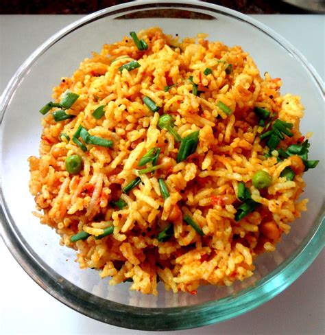 Tomato Rice with spring onions and green peas.