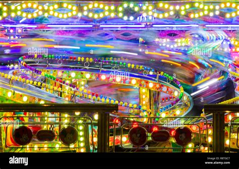 Fairground/funfair ride at night Stock Photo - Alamy