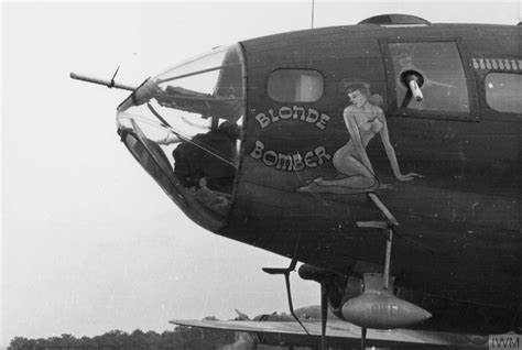 Asisbiz 42 3057 B-17F Fortress 8AF 91BG322BS LGN Blonde Bomber nose art left side 1943 FRE3572