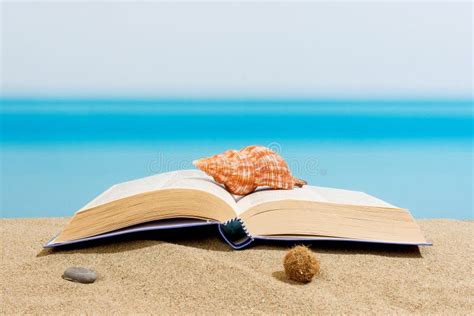 Book on the beach stock photo. Image of white, outside - 60242984