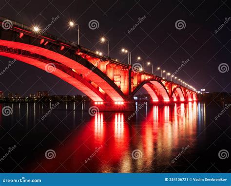 Arch Bridge Across the River at Night. Night Illumination of Buildings, Reflections Stock Image ...