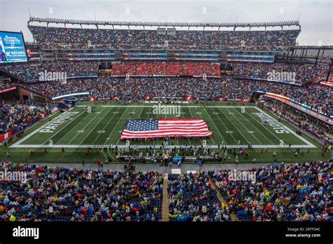 A general view of Gillette Stadium as a giant American flag is unveiled ...