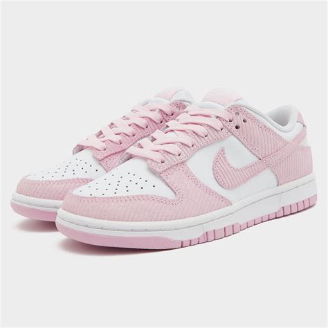 The Nike Dunk Low Pink Corduroy is a stylish and feminine sneaker with a soft pink corduroy ...