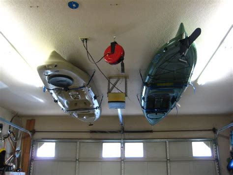 Kayak Storage - maybe one day I'll give in and hang one in my bedroom, who needs ceiling space ...