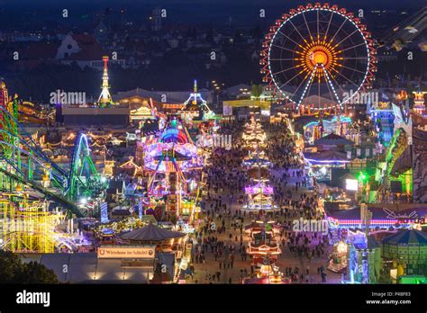 München, Munich, Oktoberfest beer festival, view, beer tent, rides, roller coaster, ferris wheel ...