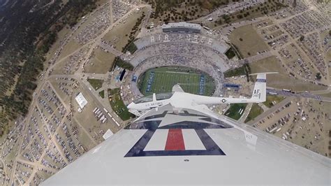 Lt. Col. Noel Williams glides over the U.S. Air Force Academy football stadium in a TG-16A ...