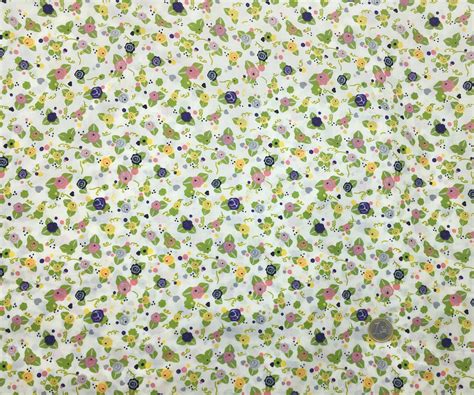 English Pima lawn cotton fabric, priced per 25cm. Flowers on off white