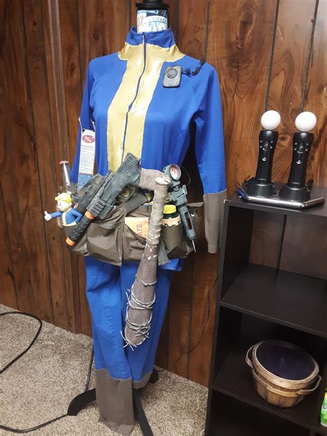 [self] Retired my Fallout 4 vault suit, now a decoration in my basement gameroom : cosplay