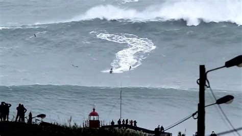 SURF EXTREME ...surf nazaré Portugal, biggest waves in the world - YouTube