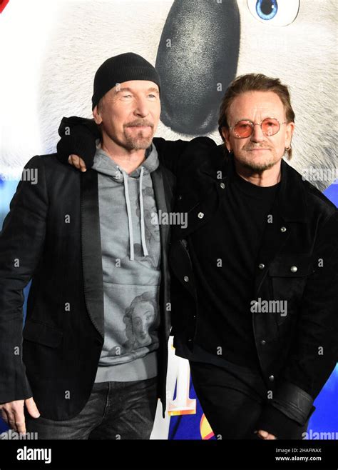 Los Angeles, California, USA 12th December 2021 Musicians The Edge and Bono attend Illumination ...