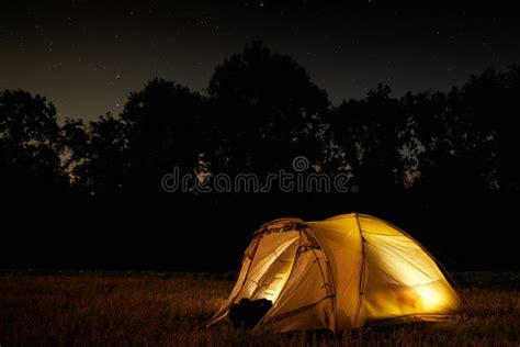 Traveling and Camping Concept - Camp Tent at Night Under a Sky Full of ...