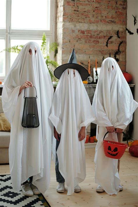 People in Ghost Costumes · Free Stock Photo