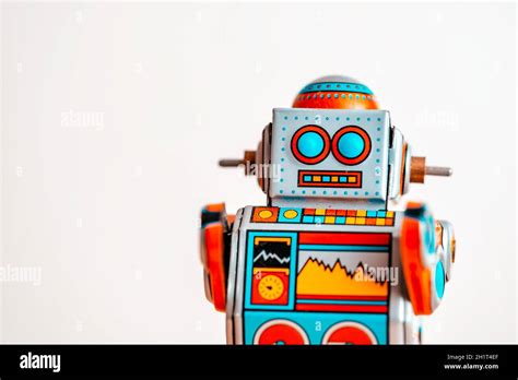 Toy wind-up robot isolated on white Stock Photo - Alamy