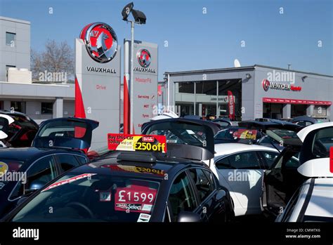 New cars for sale at a Vauxhall dealership, Bury St Edmunds Suffolk UK Stock Photo - Alamy