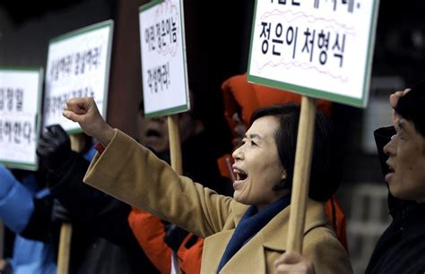 North Korean defectors protest in Seoul - Arabianbusiness