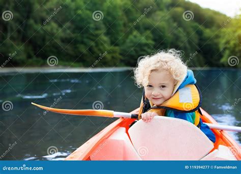 Child on Kayak. Kids on Canoe. Summer Camping. Stock Image - Image of curly, kayak: 119394277