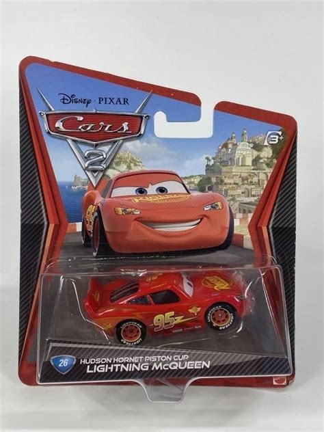 DISNEY CARS 2 PISTON CUP LIGHTNING McQUEEN NIP | Live and Online Auctions on HiBid.com