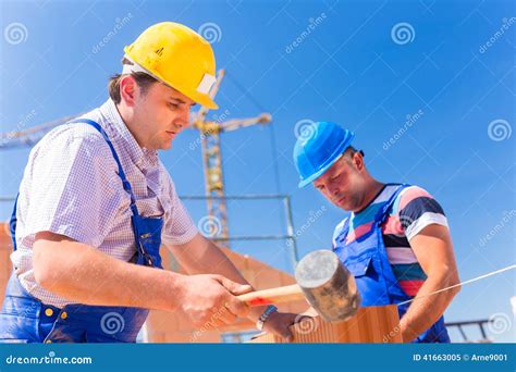 Construction Site Workers Building Walls on House Stock Image - Image of colleagues, house: 41663005