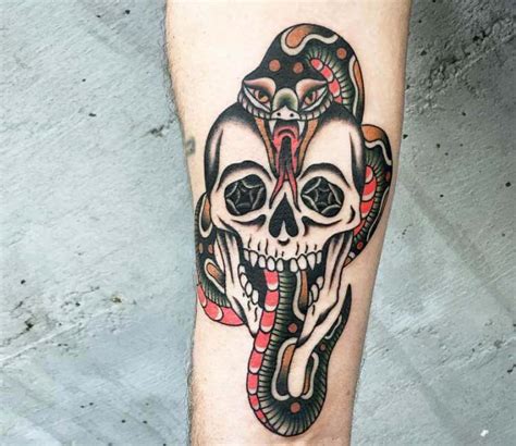 Traditional Skull And Snake Tattoo