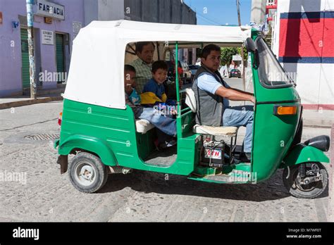 Tlacolula, Oaxaca; Mexico. Three-wheeled Moto-taxi and Passengers Stock Photo - Alamy