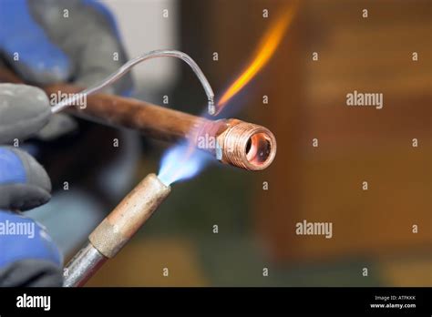 Soldering Copper Pipe High Resolution Stock Photography and Images - Alamy